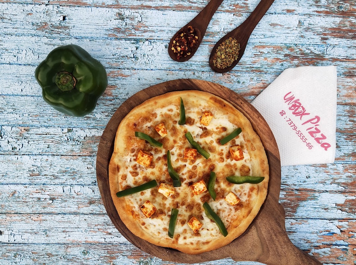 Unbox Pizza